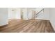 Spacious living room with wood-look floors and neutral paint is move-in ready at 1529 S Sable Blvd # C, Aurora, CO 80012