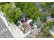 Aerial view of a modern home with a spacious rooftop deck and lush surroundings at 600 Garfield St, Denver, CO 80206