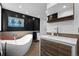 Contemporary bathroom with a freestanding tub, modern fixtures, and stylish decor at 600 Garfield St, Denver, CO 80206