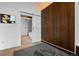 Chic bathroom featuring a modern, barn-door-style entry and luxurious walk-in shower and bathtub at 600 Garfield St, Denver, CO 80206