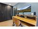 A close-up view of a desk area with wood floors and lots of storage at 600 Garfield St, Denver, CO 80206