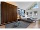 Modern bedroom with hardwood floors, vaulted ceilings, and a spacious closet at 600 Garfield St, Denver, CO 80206
