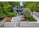Charming home showcasing a quaint, welcoming front entrance with stylish landscaping at 600 Garfield St, Denver, CO 80206