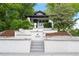 Charming home showcasing a quaint, welcoming front entrance with stylish landscaping at 600 Garfield St, Denver, CO 80206