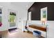 Contemporary foyer with stylish console table and a white guitar at 600 Garfield St, Denver, CO 80206
