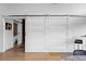 Stylish hallway with sliding barn doors and modern decor at 600 Garfield St, Denver, CO 80206