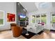 Modern living room with a fireplace, TV, and comfortable seating at 600 Garfield St, Denver, CO 80206