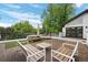 Inviting rooftop deck with comfortable seating and dining area, ideal for entertaining guests at 600 Garfield St, Denver, CO 80206