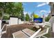 Rooftop deck featuring comfortable seating, dining area, grill and large-screen entertainment at 600 Garfield St, Denver, CO 80206