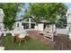 Rooftop deck featuring comfortable seating and dining area overlooking the yard at 600 Garfield St, Denver, CO 80206