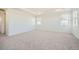 Expansive bedroom features neutral walls, carpet, recessed lighting, and several well-lit windows at 2924 S Poppy St, Morrison, CO 80465