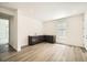 Spacious recreation room features a stylish wet bar, recessed lights and access to the outdoors at 2924 S Poppy St, Morrison, CO 80465