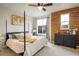 A stylish bedroom showcases a large window, comfortable furnishings, and artistic decor at 9305 S Gore St # C, Arvada, CO 80007