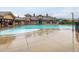 Stunning community pool and clubhouse, ideal for recreation and social gatherings with mountain views at 9305 S Gore St # C, Arvada, CO 80007