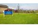Community park featuring grassy areas, a playground, and walking paths at 9305 S Gore St # C, Arvada, CO 80007