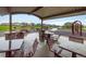 Community park picnic area featuring tables, seating, and playground views at 9305 S Gore St # C, Arvada, CO 80007