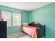 Cozy bedroom featuring natural light, and neutral-colored carpets at 3820 S Fraser St, Aurora, CO 80014