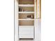 Closet with white dresser and shelving for storage and organization at 3820 S Fraser St, Aurora, CO 80014