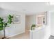 Hallway with carpet, fresh paint, and a plant for design at 4142 Chase St, Denver, CO 80212