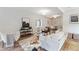 Comfortable living room showcasing hardwood floors, contemporary furnishings, and an open layout at 4142 Chase St, Denver, CO 80212