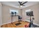 Spare bedroom set up as a personal gym space with natural light at 5108 S Pennsylvania St, Littleton, CO 80121