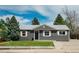 Charming single-story home with a well-manicured front yard and inviting entrance at 5108 S Pennsylvania St, Littleton, CO 80121