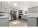 A view of the gray cabinets and stainless steel appliances in the kitchen at 811 Plum N Ave, Lochbuie, CO 80603