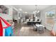 The spacious kitchen has a breakfast bar with views to the play area at 811 Plum N Ave, Lochbuie, CO 80603