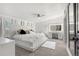 The primary bedroom suite features a fan, a vanity, and natural light at 811 Plum N Ave, Lochbuie, CO 80603