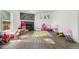 The play room has a fireplace and space for toys at 811 Plum N Ave, Lochbuie, CO 80603