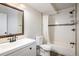 Updated bathroom with new fixtures, tile, and stylish vanity at 8770 Corona St # 101, Denver, CO 80229