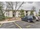 Exterior view of the townhome complex with ample parking available at 2160 S Vaughn Way # 104C, Aurora, CO 80014