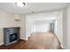 Bright living room with wood floors and a decorative fireplace at 1301 Kenton St, Aurora, CO 80010