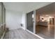 Bright sunroom with sliding glass doors offers seamless access to the kitchen, blending indoor and outdoor living at 625 S Alton Way # 3A, Denver, CO 80247