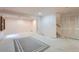 Open basement with neutral carpet and a staircase at 5362 S Danube Ct, Centennial, CO 80015