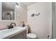 Bathroom features a sleek vanity, modern fixtures, and a glass-enclosed shower at 5362 S Danube Ct, Centennial, CO 80015