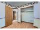 Open bedroom with a closet and an en suite doorway at 5362 S Danube Ct, Centennial, CO 80015