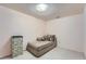 Bedroom with neutral walls, carpet floors, and a comfortable chaise lounge at 5362 S Danube Ct, Centennial, CO 80015