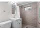 Modern bathroom with sleek vanity, subway tile shower, and contemporary fixtures for a luxurious experience at 3117 Victor St, Aurora, CO 80011