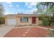 Charming single-story brick home with a well-manicured lawn and a one-car garage at 3117 Victor St, Aurora, CO 80011
