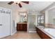 Bathroom with a soaking tub, walk-in shower, and double vanity at 1519 Stonehill Ct, Castle Rock, CO 80104