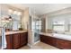 Bathroom features a soaking tub, separate shower, and a classic vanity with great lighting at 1519 Stonehill Ct, Castle Rock, CO 80104