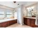 Comfortable bathroom with a large soaking tub, separate shower, and double vanity at 1519 Stonehill Ct, Castle Rock, CO 80104