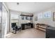 This bedroom features a comfortable layout with abundant natural light and a dedicated workspace perfect for studying or working from home at 1519 Stonehill Ct, Castle Rock, CO 80104