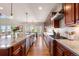 Gourmet kitchen with expansive countertops, stainless steel appliances, and gas range at 1519 Stonehill Ct, Castle Rock, CO 80104