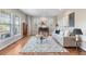 Comfortable living room with natural light, plush sofa, and stylish decor at 1519 Stonehill Ct, Castle Rock, CO 80104