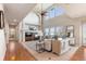 Spacious living room with high ceilings, fireplace, and hardwood floors at 1519 Stonehill Ct, Castle Rock, CO 80104