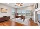 Comfortable home office with hardwood floors, lots of natural light, and a fireplace at 1519 Stonehill Ct, Castle Rock, CO 80104