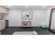 Finished basement area with workout space, wet bar, and rubber flooring at 1544 S Fillmore St, Denver, CO 80210