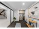 Basement workout area with wet bar, rubber flooring, and plenty of space for equipment at 1544 S Fillmore St, Denver, CO 80210